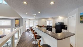Clubhouse Kitchen with Breakfast Bar at University Ridge Apartments, Durham, 27707
